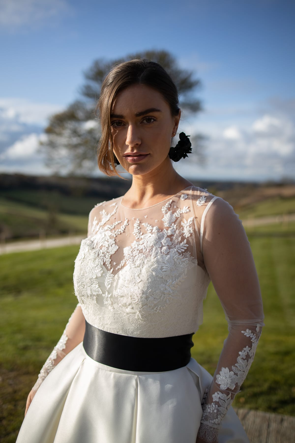 Close up of bride with black earrings