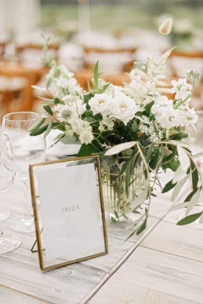 Brass frame with table name for wedding