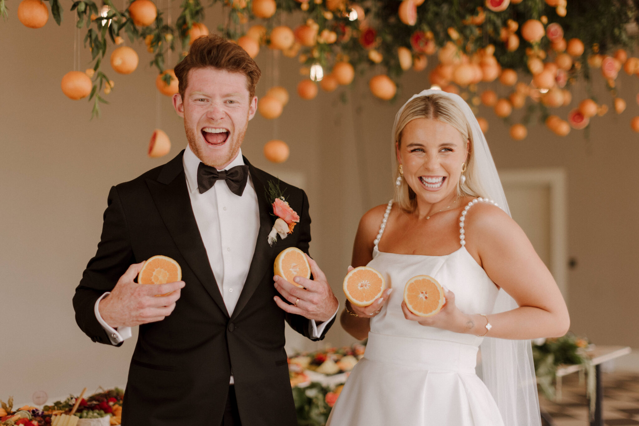 Bride and Groom with oranges