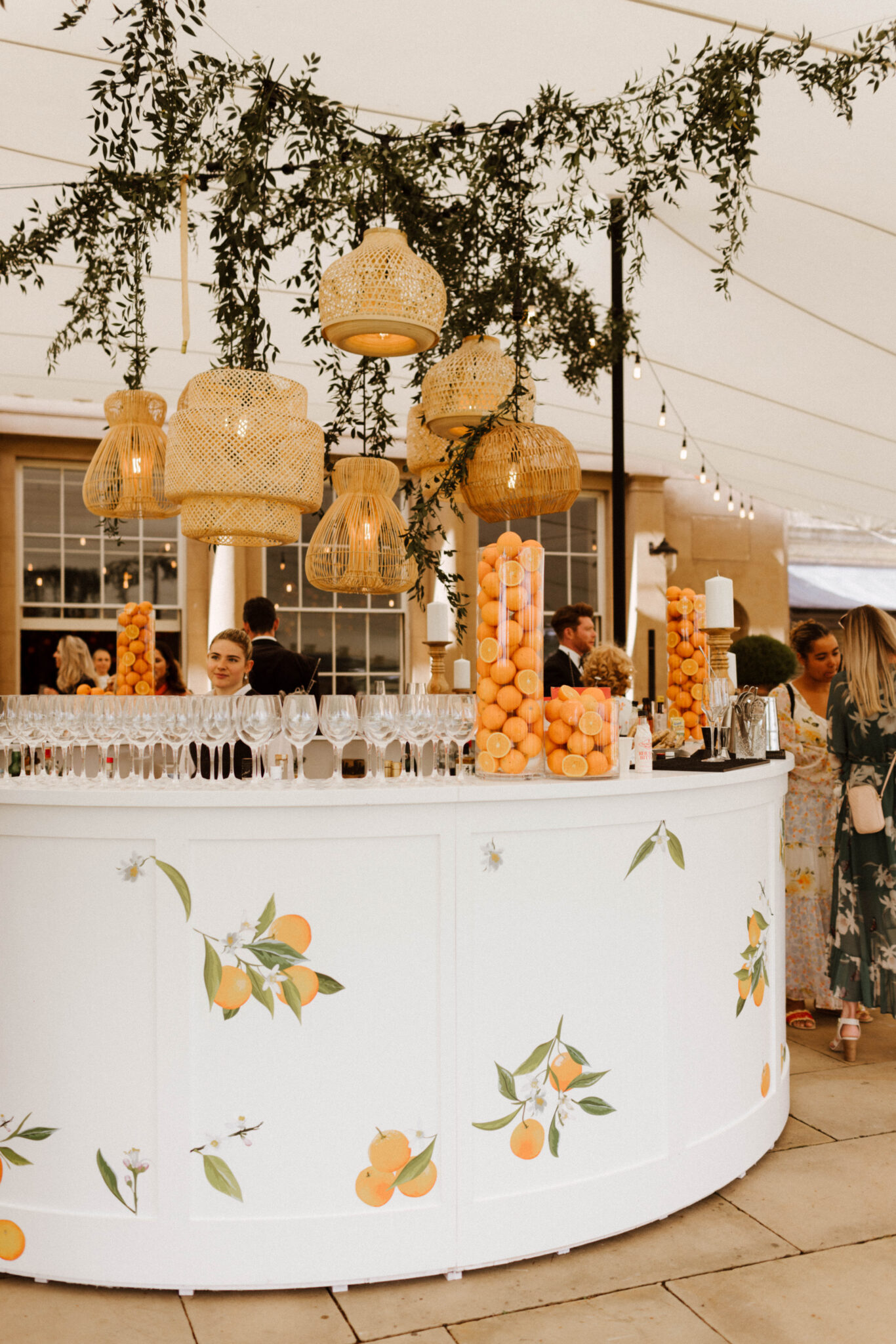 Round bar with oranges decals, at wedding